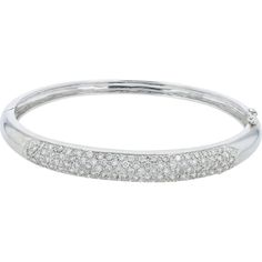 Escape to an era of elegance with a timeless treasure: the 18K White Gold 2.26 Carat Diamond Bangle. Crafted with exquisite attention to detail, this bangle exudes sophistication and grace. The main attraction? A dazzling diamond, weighing a substantial 2.26 carats, set delicately in lustrous 18K white gold. As it adorns your wrist, it whispers tales of luxury and refinement, making every gesture a statement of style.This bangle is not just an accessory; it's a symbol of opulence and class. Whether worn alone for a touch of understated glamour or stacked with other favorites for a bolder look, it elevates any ensemble effortlessly. Let its radiant sparkle capture the light and hearts of onlookers, leaving a trail of admiration in its wake.Indulge in the allure of fine jewelry with this stu Luxury Polished White Gold Bangle, Luxury Classic Diamond White Bangle, Timeless Wedding Tennis Bracelet With Pave Setting, Timeless Tennis Bracelet With Pave Setting For Wedding, Timeless Platinum Bangle Diamond Bracelet, Diamond Bracelet With Pave Setting For Anniversary, Silver Cubic Zirconia Bangle With Pave Setting, Elegant Sparkling Diamond Bracelet For Anniversary, Dazzling Round Diamond Bracelet With Pave Setting