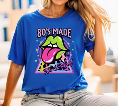 Vintage style 80's/90's t shirt! Perfect for all those born in the 80's and raised in the 90's! We use high quality Bella Canvas t shirts. They are soft cotton and are very comfortable! They come in unisex Adult sizes.  The design is made either a direct to film print. They are pressed by us, not a print on demand. The prints are made to last!  Our shirts are made to order so we do not offer refunds. However, we are happy to exchange for a different size if needed within 7 days.  If you need a d 90s Inspired Blue T-shirt With Letter Print, 90s Retro Print Top For Streetwear, Trendy Retro Print T-shirt For Streetwear, 90s Retro Print T-shirt For Streetwear, Funky Shirt, Funky Shirts, 80s Shirts, Retro Mode, Film Prints