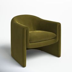 a green chair sitting on top of a white floor