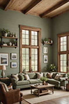 a living room filled with lots of furniture next to two large windows on the wall