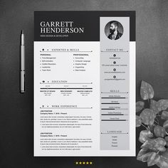 a black and white resume template on a desk with a pen, pencil and plant