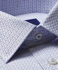 100% long staple cotton Dobby Weave Spread collar dress shirt Adjustable barrel cuff French placket Includes a pair of silver plated collar stays Two back pleats for extra comfort Imported Dobby Weave, Collar Stays, Stylish Mens Outfits, Clothing Hacks, Collar Dress, Dress Shirt, Printed Shirts, Barrel, Silver Plated