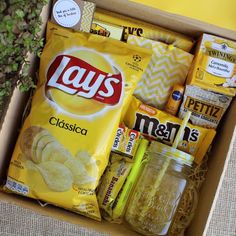 a box filled with chips and other snacks