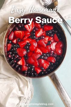 berries and blueberries in a saucepan with the words, easy homemade berry sauce