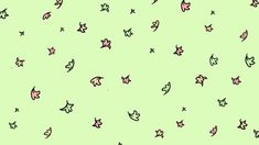 a green background with small pink and black stars on the left side of the image