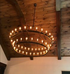 a chandelier hanging from the ceiling in a room