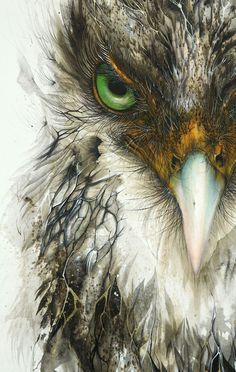 an owl's face with green eyes is shown in this watercolor style painting