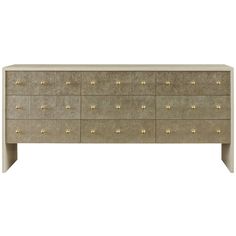 an image of a dresser with gold knobs on the top and bottom drawer drawers