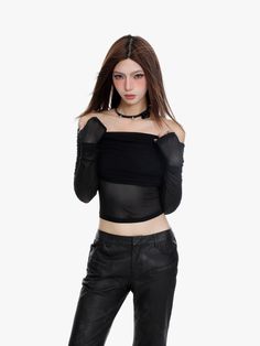 Step into edgy elegance with our Off-Shoulder Layered Sheer Sleeve Crop Top, a statement piece that masterfully blends allure with comfort.
Crafted with a focus on quality, this crop top features a sophisticated off-shoulder neckline and long sheer sleeves, providing a stylish juxtaposition of textures. The solid color design ensures a sleek and versatile look, while the slim-fit silhouette showcases a delicate balance between form-fitting appeal and wearable ease.
Perfect for a range of social Edgy Elegance, Chic Blazer, Urban Wear, High Waisted Trousers, Sheer Sleeves, Sleeves Pattern, Black Crop Tops, Batik, Off Shoulder