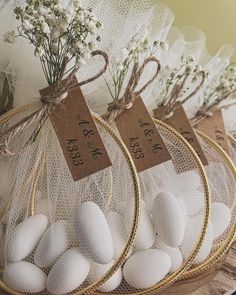 small white eggs are wrapped in burlock and tied with twine for decoration