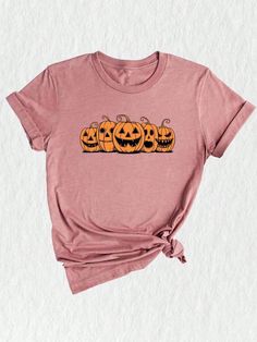 Introducing our trendy pumpkin shirt, the perfect addition to your fall season wardrobe!  This cute and spooky shirt features a fun and vibrant design that will make you the center of attention at any Halloween gathering. Whether you're a mom looking for a stylish yet comfy outfit or searching for a Halloween shirt for the little ones, our peace love pumpkin shirt is perfect for the whole family! ‍✨ Crafted with high-quality materials, our pumpkin t-shirt offers utmost comfort and durability, en Cute Fall Shirts, Comfy Outfit, Coquette Bow, Unique Halloween, Pumpkin Shirt, Fall Shirt, Trendy Fall, Halloween Tees, Retro Halloween