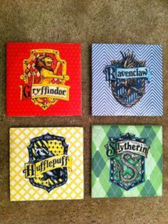 four harry potter coasters are on the floor in front of a carpeted area