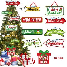 a christmas tree with many different signs on it