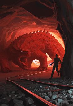 a man standing next to a giant red dragon in a cave with train tracks leading up to it