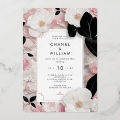 a wedding card with flowers and leaves on the front, in black and white colors