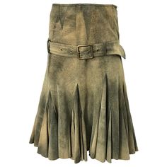 Chic early 2000s JOHN GALLIANO brown distressed print leather skirt! Features a soft leather with a distressed print. Drop waist has a belt that buckles in the front. Flattering descending pleats. Hidden zipper up the side with hook-and-eye closure. Very well made with the careful attention to detail one would expect from Galliano. Can easily be dressed up or down. Would look great with a crop top, tank, or crisp white blouse. In great condition. Made in Italy Marked Size US 4 Measurements: 28 inch waist 36-38 inch hips 27 inches in length Pink Suede Skirt, Stealing Money, Tan Suede Skirt, Crisp White Blouse, Belted Skirt, Cotton Voile Fabric, Jacquard Skirt, Suede Skirt, Skirt Belt