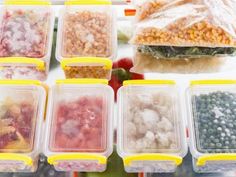 plastic containers filled with different types of food