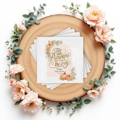 three napkins sitting on top of a wooden plate with flowers around it and the words, this pumpkin is the way