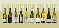 several bottles of wine are lined up in a row with the words sauvgnon blanc above them