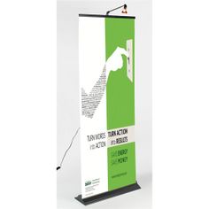 a green and white roll up banner with a hand holding a lightbulb on it