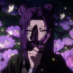 a woman with purple hair holding a butterfly in front of her face