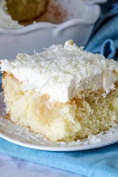 a piece of coconut cake on a plate