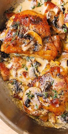 chicken with mushrooms and cheese in a pan