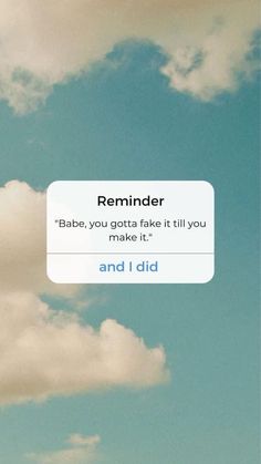 a cell phone with the text reminder on it and clouds in the sky behind it