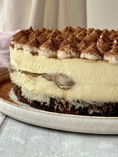 a large piece of cake sitting on top of a white plate