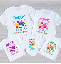 three matching birthday shirts with the words daddy, sister, and baby shark on them