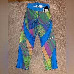 Womens Xs Brand New With Partial Tag Fitted Multicolor Color Block Pants, Sporty Multicolor Pants For Spring, Multicolor Athleisure Bottoms For Spring, Fitted Color Block Blue Bottoms, Fitted Multicolor Color Block Bottoms, Fitted Blue Sportswear Pants, Spring Blue Athletic Pants, Nike Multicolor Casual Bottoms, Nike Casual Multicolor Bottoms