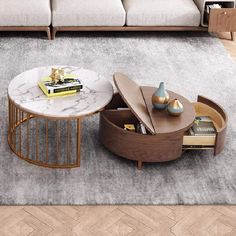 a living room with a couch, coffee table and bookshelf on the floor