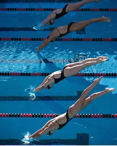 three women are swimming in the pool and one is jumping into the water with her legs up