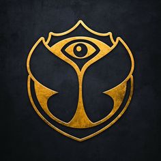 an eye in the center of a golden emblem