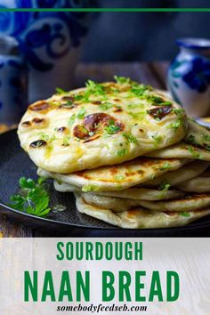 there is a plate with some food on it and the words sourdough naan bread