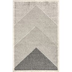 a black and white rug with an abstract design on the bottom, in front of a white background