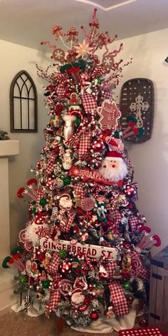 a christmas tree decorated with red, white and green ornaments