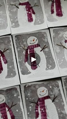 snowmen are drawn on paper and placed in squares