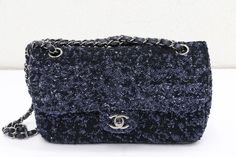 Chanel Timeless Blue Night Micro-Glitter Flap Bag 20464110 - In good condition  - Sides in good condition  - Inside portion in good condition  - INNER LEATHER PORTION HAS SOME SIGNS OF WEAR/SCRATCH MARKS - MAGNETIC CC CLASP HAS SOME SCRATCH MARKS  - No Dust Bag  - No Box  - Condition 7.5 out out of 10 Bag Dimensions: Height: 5.12 Inches Depth: 2.17 Inches Length: 10 Inches  Classic Chanel Timeless flap bag in micro-glitter blue night. Dark silver metal hardware. CC signature clasp. Dark blue metallic leather interlaced chain. Classic Chanel, Blue Night, Boxing Conditioning, Metal Hardware, Metallic Leather, Flap Bag, Chanel Classic, Metallic Silver, Bags Handbags