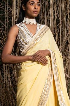 Yellow georgette saree with pearl and sequin embroidered border. Comes with unstitched blouse fabric.
Components:2
Pattern:Embroidery
Type of Work:Sequin and Pearl
Fabric:Georgette
Color:Yellow
Other Details:
Occasion:Mehendi and Haldi,Sangeet - Aza Fashions Traditional Georgette Pre-draped Saree With Pearl Embroidery, Festive Pearl Embroidery Saree, Pearl Embroidered Saree For Festivals, Festival Saree Blouse Piece With Pearl Embroidery, Bollywood Style Georgette Blouse With Pearl Embroidery, Traditional Georgette Saree With Pearl Embroidery, Diwali Saree Blouse Piece With Pearl Embroidery, Bollywood Style Pearl Embroidered Georgette Blouse Piece, Designer Georgette Saree With Pearl Embroidery