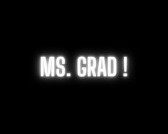 the words ms grad are lit up in the dark with white letters on it