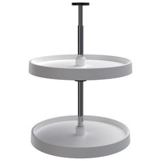 two tiered white cake stand with black top and metal base on an isolated background