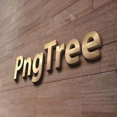 the sign for png tree is mounted on the side of a building with gold lettering