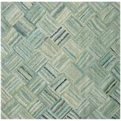 an area rug with green and blue colors