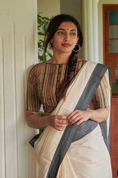 "THE KAITHARI PROJECT Hand block printed Kalamkari Designed and tailored in Kerala Sleeve length : XS - 11\", M - 11.5\" Model wears an XS Dry wash only Blouses have plenty of margin along the hand and the bust for alteration if required. SIZING DETAILS How to Measure Bust: Measure under your arms at fuller part of bust. Keep tape level across shoulder blade BLOUSES XS : Bust 34-35 inches (86-89 cm) S : Bust 36-37 inches (91-94 cm) M : Bust 38-39 inches (97-99 cm) L : Bust 40-41 inches (102-104 Patchwork Blouse, Boat Neck Blouse Design, Cotton Saree Blouse Designs, Cotton Saree Blouse, Blouse Ideas, Kids Blouse Designs, Sari Blouse Designs, Patch Work Blouse, Back Neck Designs