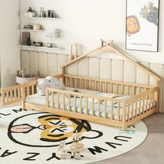 a child's room with a baby crib and toys on the floor in front of it