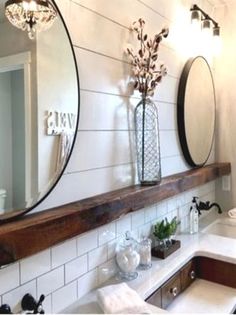 a bathroom with a sink, mirror and bathtub