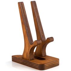 two wooden sculptures sitting on top of each other