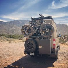 a van with two bikes on the back