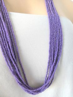 "Long purple necklace, beaded purple necklace, beaded boho necklace, lilac necklace, multistrand necklace, for her, bridesmaids, wedding. The necklace has 9 strands and it's available with silver and gold clasp. Size shown is 30\". Please read specifications on SIZES below: ❤ SIZES This item comes in several sizes, kindly choose at checkout. The easiest way to find out which length suits you best is to measure a necklace you already own, from one end to the next, including clasp. You can also us Elegant Multi-strand Purple Beaded Necklaces, Elegant Purple Multi-strand Beaded Necklaces, Bohemian Multi-strand Purple Beaded Necklaces, Purple Multi-strand Bohemian Beads, Bohemian Multi-strand Purple Beads, Purple Bohemian Multi-strand Beads, Bohemian Purple Multi-strand Beads, Handmade Purple Multi-strand Beads, Lilac Necklace